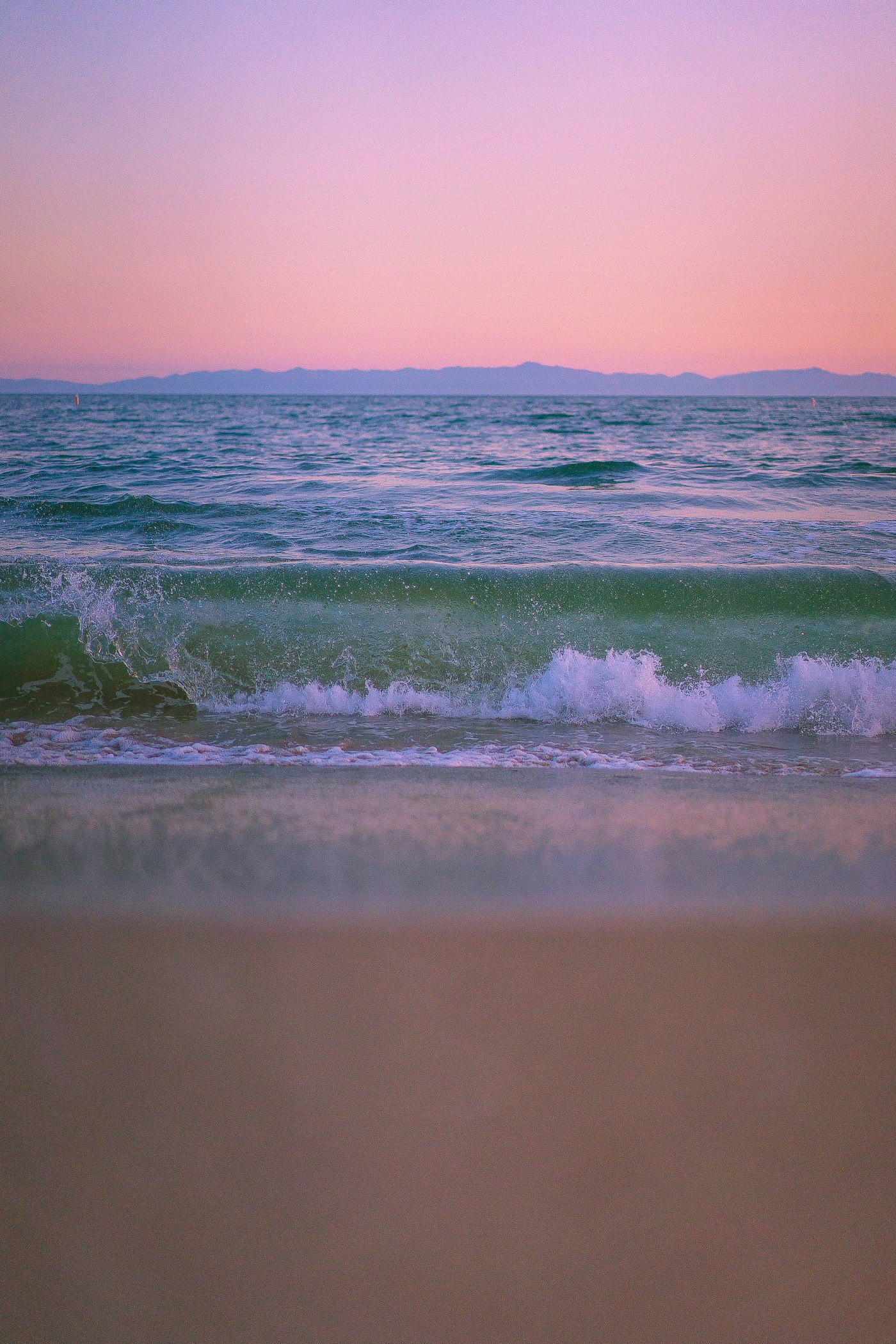 Waves along the Santa Barbara coastline at sunset